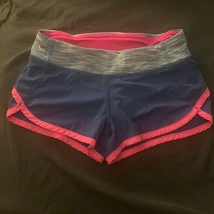 Ivivva size 6 running shorts blue/purple color with pink trim